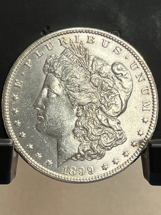 1899-O Morgan Silver Dollar Gem Brilliant Uncirculated Mirror Proof-Like Mint State Cartwheel Luster